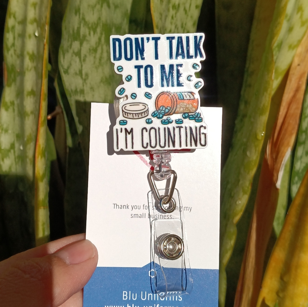 Pharmacist badge reel holder